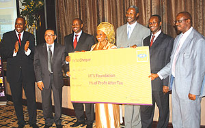 MTN Foundation board members recieve the dummy cheque at Serena on Tuesday. (Photo/ The New Times)