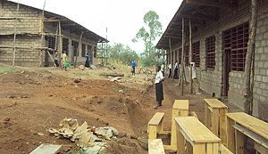 Students at Rurenge Secondary School helping to complete their classrooms. 