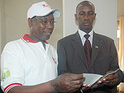 Rwanda Heart Foundation boss Dr Joseph Mucumbitsi explains to MP Giovanni Renzaho about the heart desease during a sensitisation campaign held last year