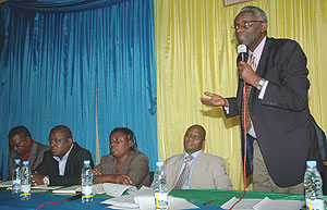 ISSUED CALENDAR: NEC Chairman Prof. Chrysologue Karangwa, NEC Executive Secretary Charles Munyaneza with some commissioners at a recent meeting. (File Photo)