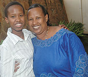 Keren Neza with her Mother pictured immediately after the release of the Ou2019level results. (File Photo)