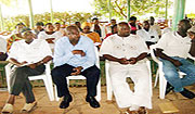 Businesspersons and local leaders ponder the way forward at the meeting. (Photo / S. Rwembeho)