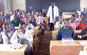 Teacher Vedaste Habiyaremye in the presence of his students at Rwinkwavu Secondary School. Photo / S. Rwembeho)