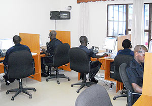 Officers recieving calls inside the Emergency Call Centre at the Police HQ in Kacyiru. (Photo/ I. Mugisha)