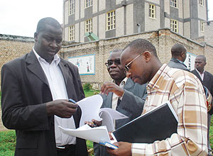 ON THE RUN: Alexis Kwifasha (right) talking to the areau2019s school directors in Muhanga, last year. (Photo/ D.Sabiiti)