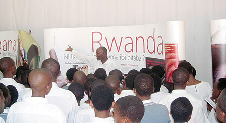 Students from participating secondary schools being taken around the exhibition on the ICTR achievements and challenges. (Photo: P. Ntambara)