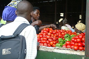 Traders  selling tomatoes in Kimironko market.(File photo)