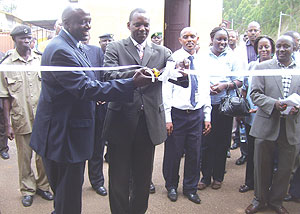 The PS in the Ministry of E.A.C Affairs (L), Robert Ssali flanked by Ugandau2019s Ambassador to Rwanda, Richard Kabonero, at the launch of the one-stop border post (Photo A, Gahene)