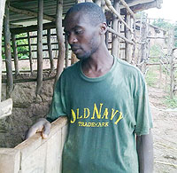 Sixbert Barigora, a member of the association infront of his kraal. (Photo: J.P Bucyensenge)