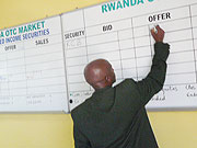 Celestin Rwabukumba, the operations manager of the Capital Market Advisory Council (CMAC) conducting trading at the Rwanda Over -The-Counter  ROTC) market.