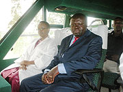 ENJOYING THE RIDE; Minister Christopher Bazivamo and Permanent Secretary in the Ministry of Education, Sharon Haba enjoy a ride in the biodiesel Express Bus (Photo;C. Kwizera)