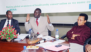 Minister of Environment, Stanislas Kamanzi makes a point. He is flanked by Rose Mukankomeje (R) and John Gara.