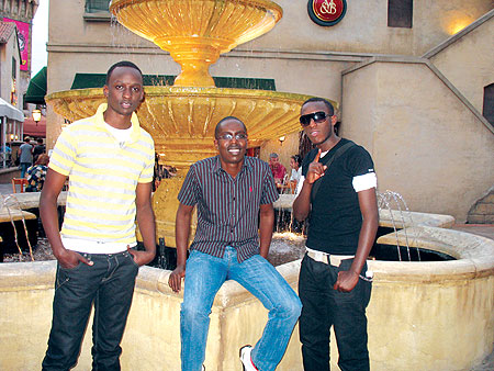 (L-R) Meddy, Aimable Kubana, and The Ben pose for a photo.