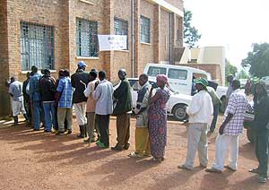 Ex-combatants lining up for medical examination at Gicumbi district on Wednesday. (Photo:  A. Gahene)