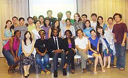 Students at the Singaporeu2019s Lee Kuan Yew School of Public Policy in a group photo with Paul Kayoboke (Courtsey Photo)