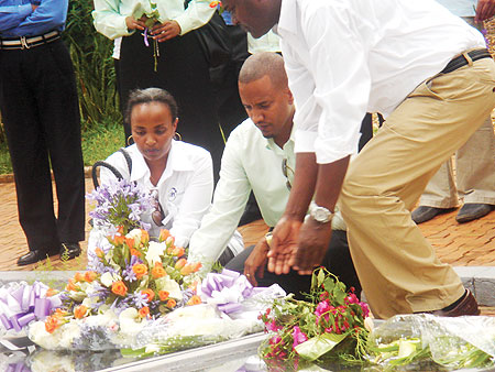 DN international CEO, Nathan Loyd and his wife laying a wreath. (Photo/ F. Ndoli)