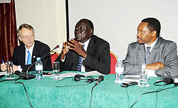 Justice Minister Tharcise Karugarama (C) Prof Anastase Shyaka, (R) and Denis Weller ,the USAID Mission Director at the opening of the workshop. (Photo J Mban