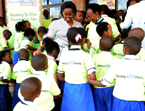 First Lady Jeannette Kagame talks to children at the end of the function at  prime holdings yesterday. (Photo J Mbanda)