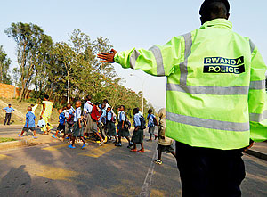 A police office doing his job. Female officers should be deployed in certain situations.