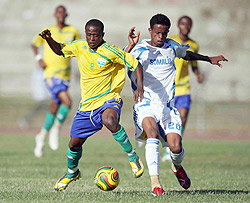 Amavubi Stars midfielder Haruna Niyonzima battles for possesion with a Somali opponent during last yearu2019s Cecafa Senior Challenge Cup in Nairobi. The APR player will be key to Rwandau2019s  chances against Tanzania.(File photo )