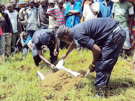 Police officers set marijuana ablaze in Mururu sector.