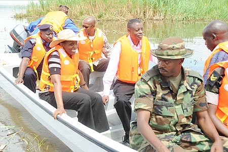 Ministers Kabarebe, Kalibata, Harelimana and Commissioner General of Police Emmanuel Gasana on one of the speed boats in Lake Mirayi in Bugesera District. (Photo/ J.Mbanda)