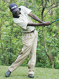 Ruterana takes a swing in a previous event. (File photo)