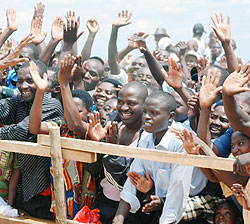 With smiles. Residents of Nyagatare district ready to receive President Kagame at Rwimiyaga play ground on Wednesday. (Photo D Ngabonziza)