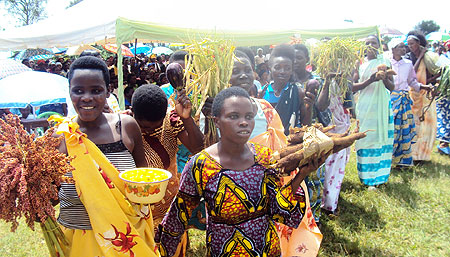 Women graduates display some of their modern agricutural products. 