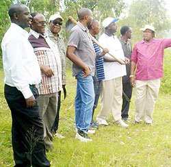 Humphrey Ahimbisibwe the Headmaster of Ntare school (2nd left) with some of the Ntare Old Boys during Umuganda at Rebero hill, Bugesera district yesterday (Courtesy photo)