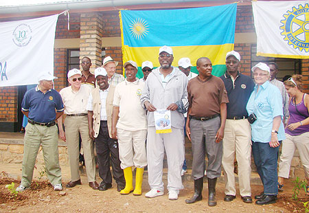 Rotary club members pose for a photo infront of the health post (Photo: F. Ndoli)