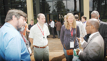 ICT Minister, Dr Ignace Gatare (R), talks to ICT experts during the meeting yesterday (Photo F Goodman)