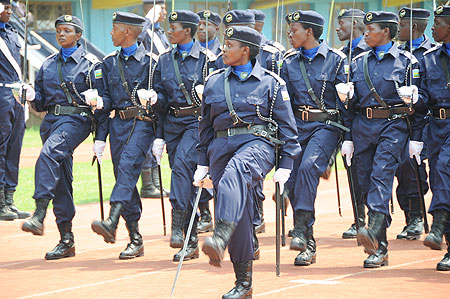 Female police lead the squad.