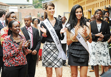 Miss Universe and Miss USA with Dr. Coline Karema (L) and Dr. Anita Asiimwe when the two beauties visited TRAC plus on Thursday . (Photo J Mbanda)