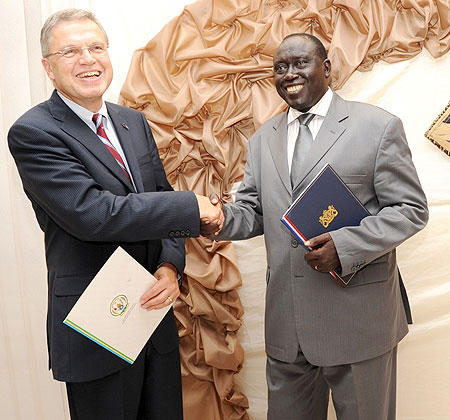 Ministers Ernst Hirsch Ballin (L) and Tharcisse Karugarama after signing the Letter of Intent. (Photo: J. Mbanda)