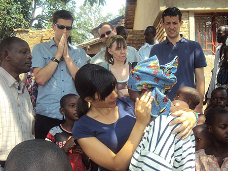 One of the Scottish Christians shares an emotional moment with a Rwandan lady in Kamonyi District (Photo D.Sabiiti)