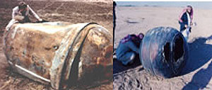 L-R : The 250 kg stainless steel structure main propellant tank of the second stage of a Delta 2 launch vehicle which landed near Georgetown, TX, on 22 January 1997 ; A titanium motor casing weighing about 70 kg, landed in Saudi Arabia about 240 km from t