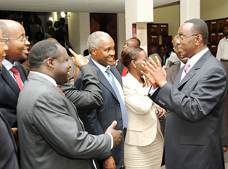 Prime Minister Bernard Makuza shares a light moment with members of the cabinet on Wednesday (Photo T Kisambira)