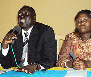 Minister Karugarama speaking to the mediation committee members in the company of local officials.Photo B Mukombozi