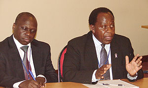 Dr Julius Lutwama, (R) the Principal Health Officer at the Uganda Virus Research institute addresses the media in Entebbe. (Photo; E. Kabeera)