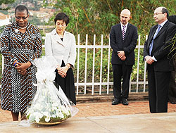 World Bank Vice Presidents Obiageli Ezekwesili (L) and Izumi Kobayashi paying tribute to Genocide victims at Kigali Genocide Memorial Centre (Photo; J. Mbanda)