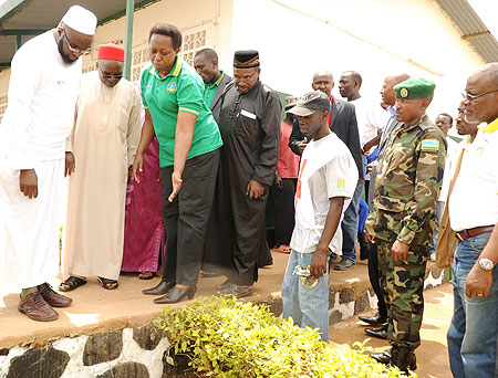 Kigali City Mayor Aisa Kirabo Kacyira (3rd left) being conducted around Kacyiru Mosque by Islamic leaders yesterday. (Photo: J. Mbanda)