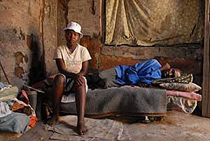 Lesotho - Mamaribe Hata-Hata, 17, nurses her HIV-positive father. Her mother has passed away.(Photo, IRIN)