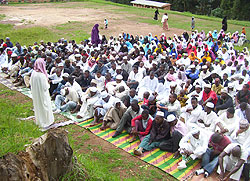 Sheikh Nsanzimana conducting prayers at Gacurabwenge primary school yesterday (Photo; A. Gahene)