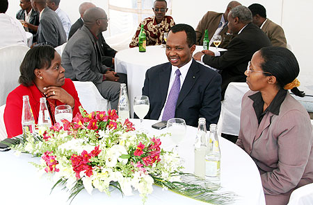 Hon. Vincent Karega (C) with Hon. Colletta Ruhamya (R) and Permanent Secretary Marie Claire Mukasine (Photo; T. Kisambira)