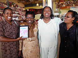 AVEGA members posing with an award at Kigali International Airport (Courtesy photo)