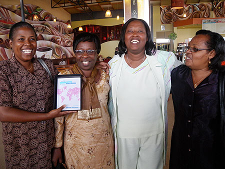 AVEGA members posing with an award at Kigali International Airport (Courtesy photo)