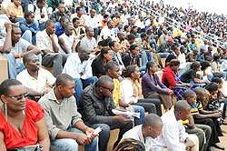 Thousands waiting to sit driving permit examinations at Amahoro National Stadium yesterday (Photo; T. Kisambira)