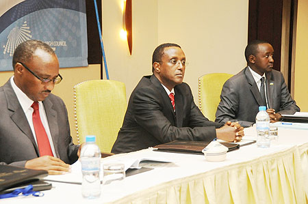 Senate President Dr. Vincent Biruta (C) with Hon. Protais Musoni (L) and MHC Executive Secretary Patrice Mulama during the conference yesterday (Photo; T. Kisambira)