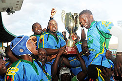 HAT-TRICK HEROES: Silverbacks players show off their third consecutive CAR 15s trophy at Amahoro Stadium. (Photo T. Kisambira)